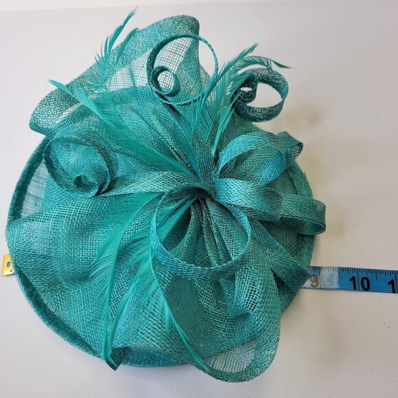 Teal Blue Fascinator with an Upturned Brim Sinamay Loops Rosettes and Feathers - Picture 14 of 16